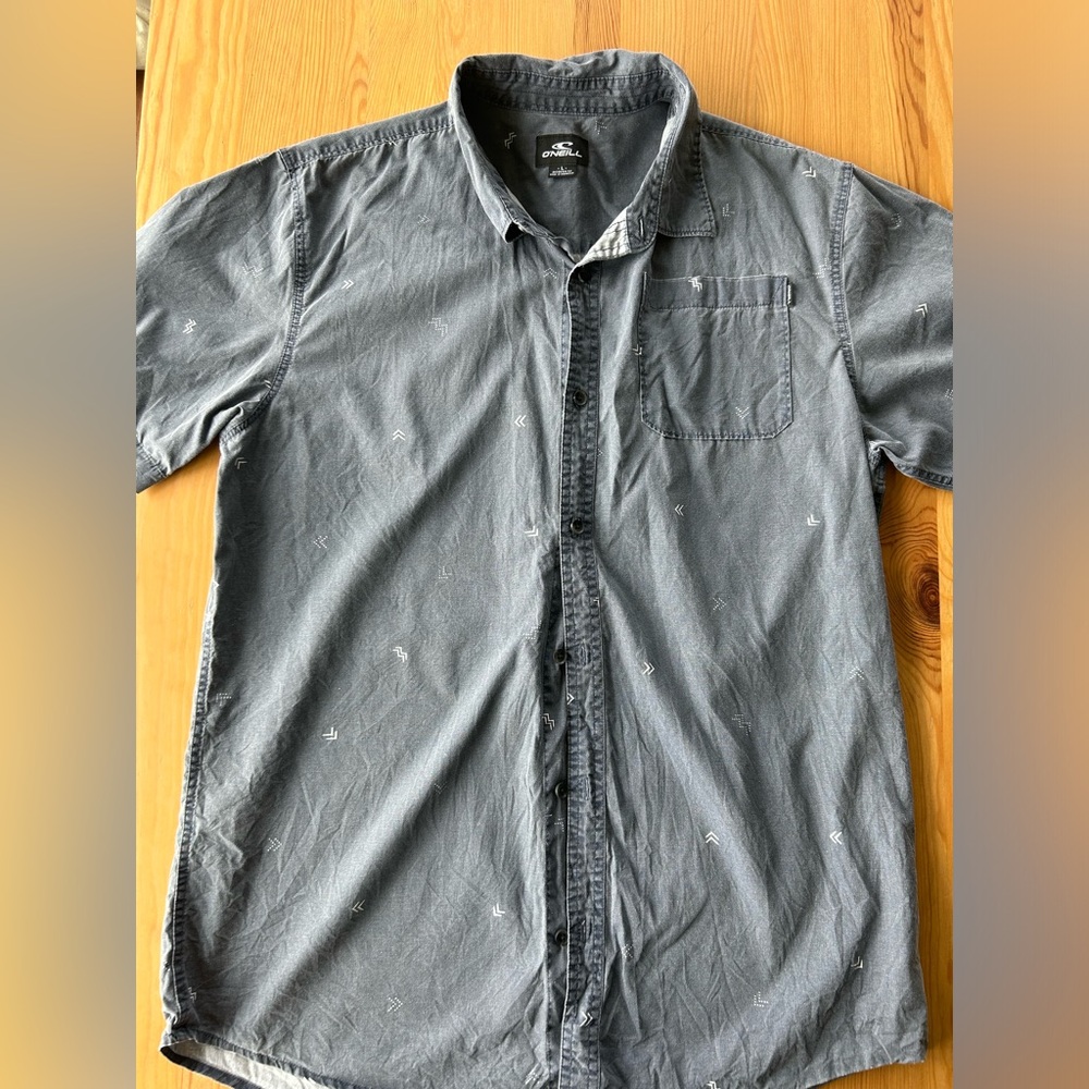 O’Neill short sleeve button down shirt. Men’s size large